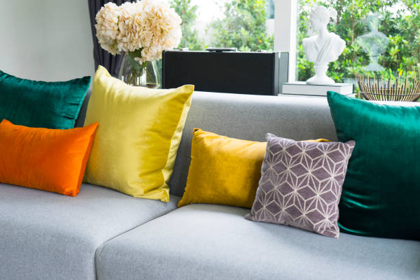 istock living room with grey sofa and colorful pillows 962904216