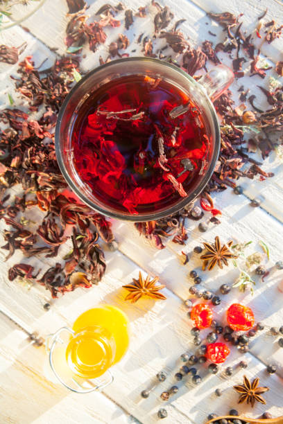 istock Red Hot Hibiscus tea in a glass mug 962904508