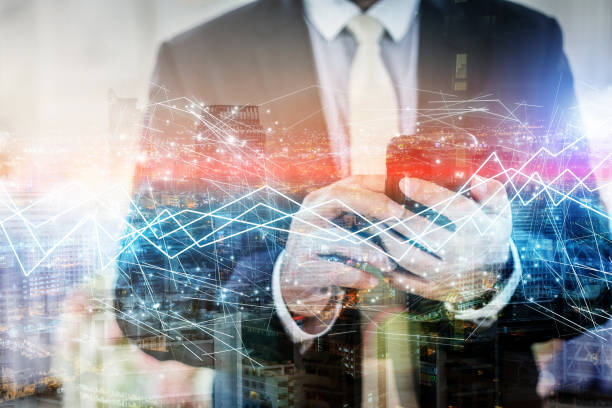 istock successful business ideas concept with businessman using smartphone for connecting people double exposure with cityscape night time 962911610