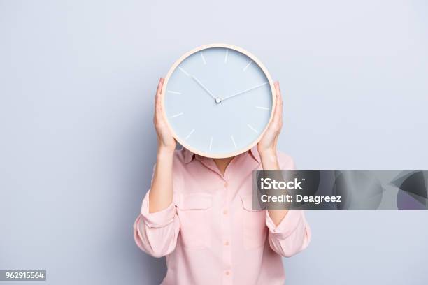 Its 1010 Oclock Portrait Of Charming Pretty Positive Cheerful Woman Closing Covering Head Face With Round Clock Isolated On Grey Background Stock Photo - Download Image Now