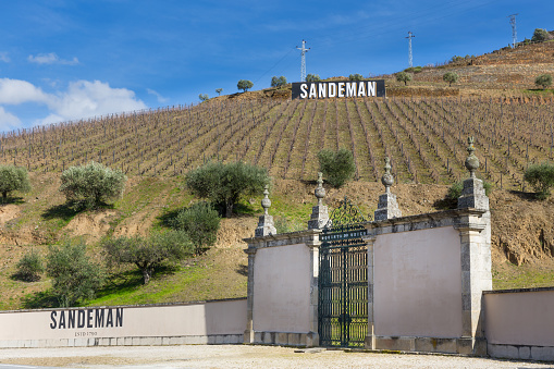 TABUACO, PORTUGAL - FEBRUARY 26, 2017: Quinta do Seixo Wine Centre of Sandeman, in the heart of the Douro Valley, with an astonishing view over the river and its steep terraced vineyards