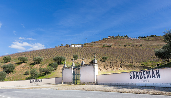 TABUACO, PORTUGAL - FEBRUARY 26, 2017: Quinta do Seixo Wine Centre of Sandeman, in the heart of the Douro Valley, with an astonishing view over the river and its steep terraced vineyards