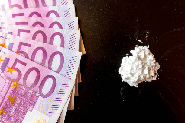 Cocaine and 500 euros banknotes Money, banknotes, drugs and cocaine Trafficking stock pictures, royalty-free photos & images