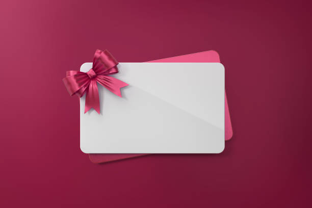 istock White And Pink Gift Cards With Pink Bow Tie On Pink Background 962925204