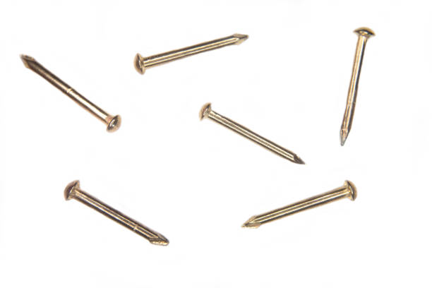 istock Metal nails on a white background seen from near and from above 962925698