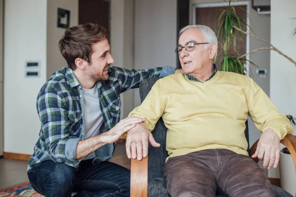 istock Father and son at home together 962929138
