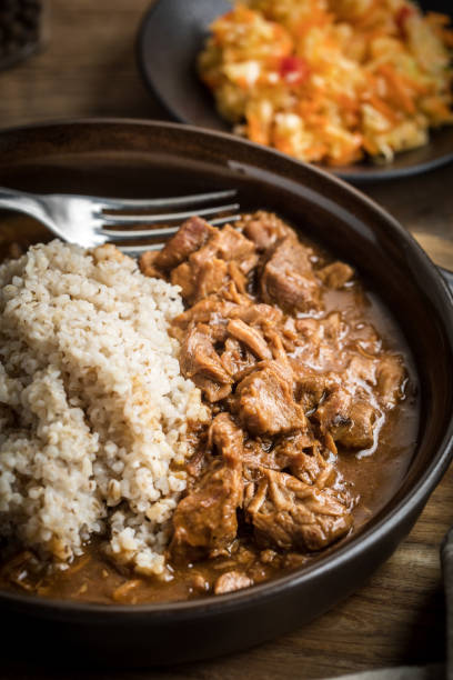 istock Barley groats with stewed meat. 962930370