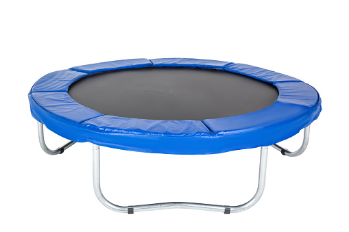 Trampoline for children and adults for fun indoor or outdoor fitness jumping on white background. Blue trampoline Isolated.