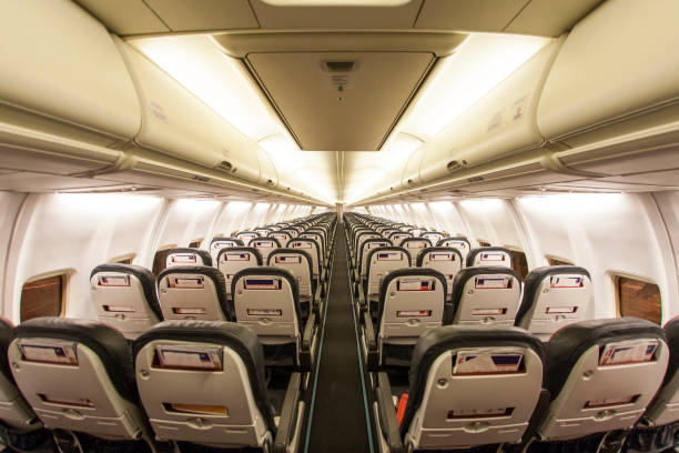 istock Seats in the economy class cabin 962935488