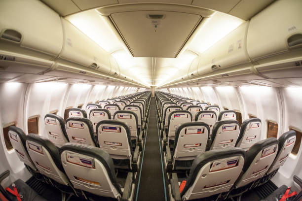 Central view of airplane seats in cabin