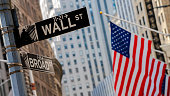 Flag and Wall street sign
