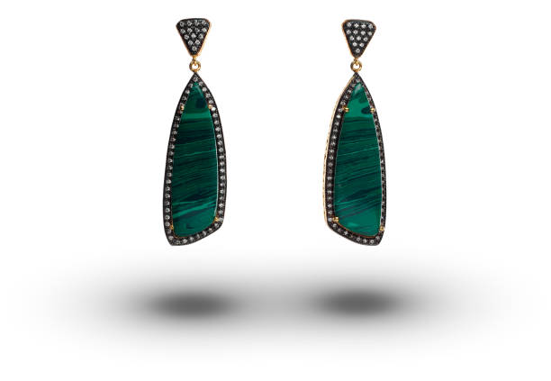 istock Beautiful earrings over white background 962943422