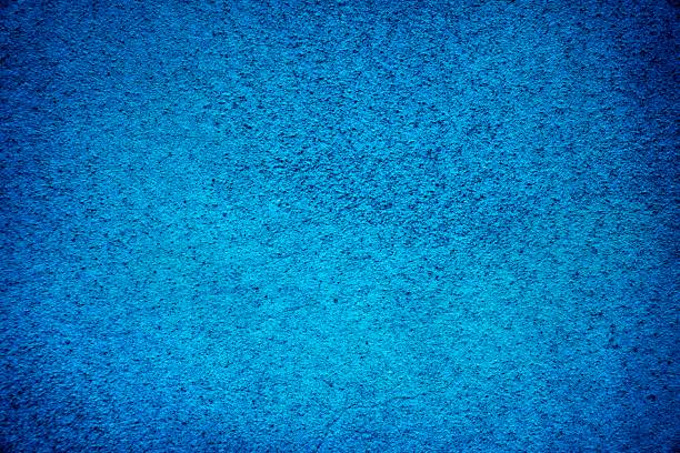 istock Rough concrete neutral ultra blue texture, stone surface, cement background 962947022
