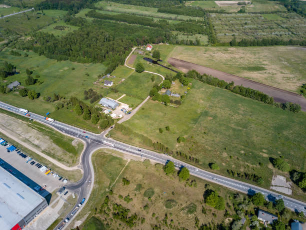 istock drone image. aerial view of transport roundabout on highway 962951868