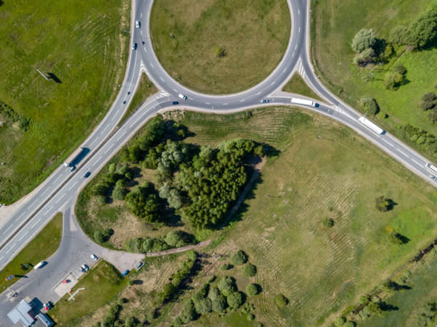 istock drone image. aerial view of transport roundabout on highway 962951944