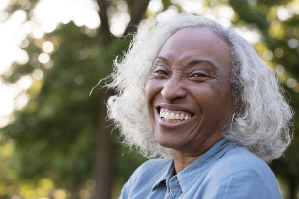 istock Senior Woman Outside Laughing 962952440