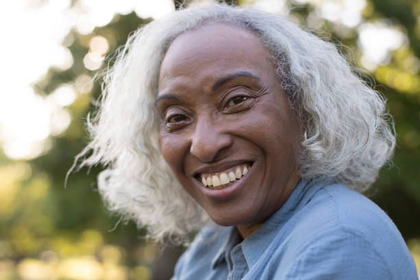 istock Senior Woman Outside Smiling 962952472