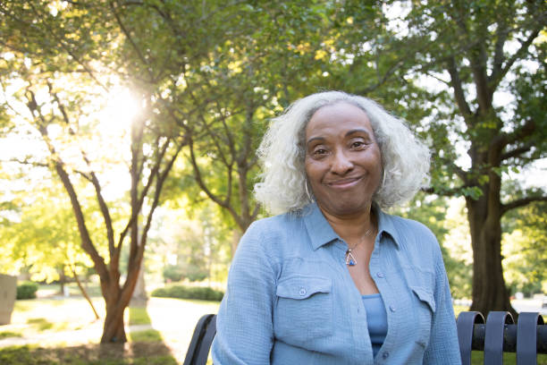 istock Senior Woman Outside on a Bench 962952658
