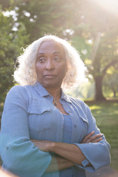 istock Serious Senior Woman Outside 962952842