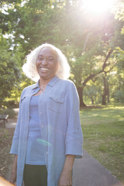 istock Senior Woman Outside Laughing 962952900