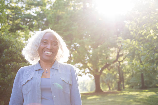 istock Senior Woman Outside Laughing 962952966