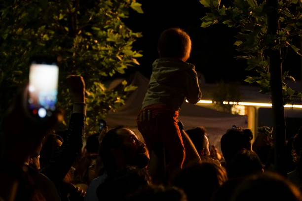 Guimaraes, Portugal: August 12, 2023: Frontal view of a night concert performance in a gazebo at guimaraes historic center, portugal