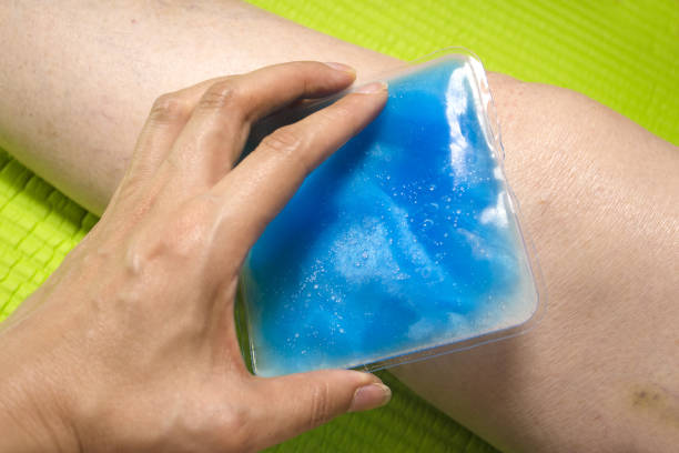 istock Old woman with ice pack for muscle aches 962959748
