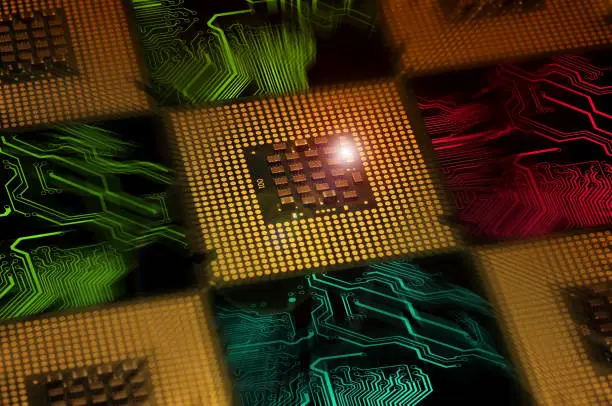 Aligned CPU Chips processor and electronic circuit with lighting effects postproduction, background.