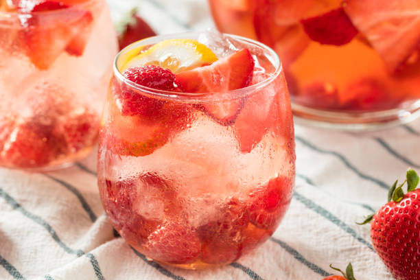 Homemade Berry Rose Sangria Homemade Berry Rose Sangria with Lmeon Ready to Drink sangria stock pictures, royalty-free photos & images
