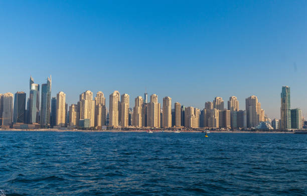 istock Panoramic view of Dubai Marina bay from sea 962963590