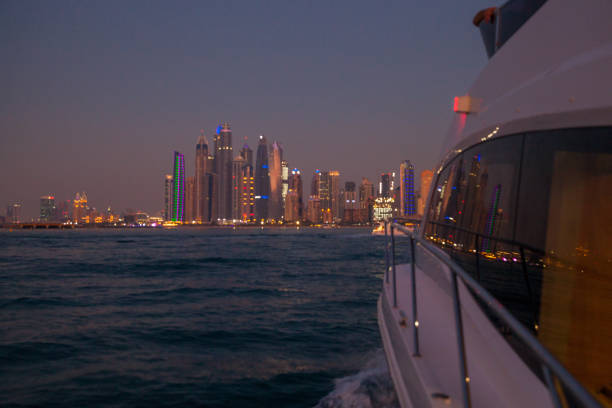 istock Panoramic view of Dubai Marina bay from yacht at night 962964204