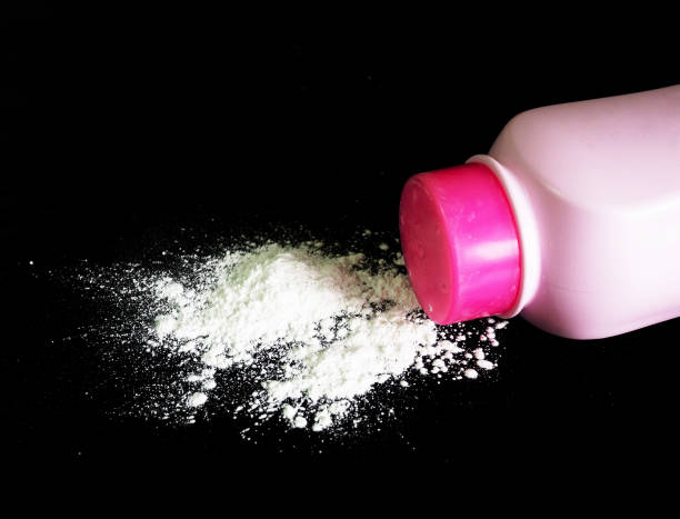 istock Baby talcum powder pink container 962964212