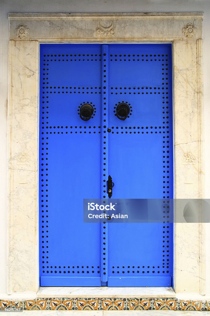 Azul de puerta - Foto de stock de Aldaba libre de derechos