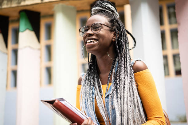 afro student/teacher on the move - campus life imagens e fotografias de stock