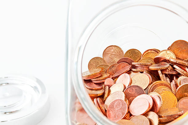 Close-up of Coins in a Glass Case with Copy Space stock photo