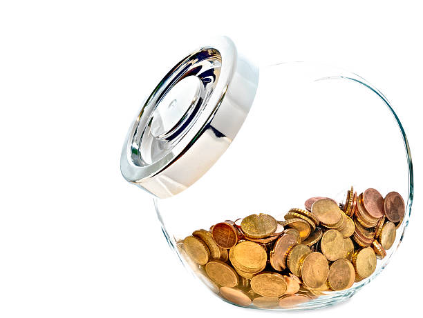 Front view of Coins in a Glass Case, White Background stock photo