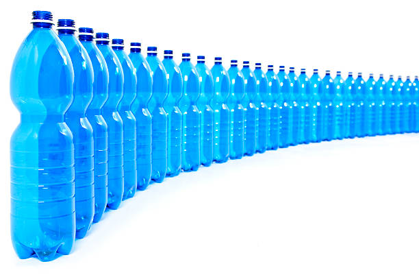 Many Blue Bottles of Water, Front View, White Background stock photo