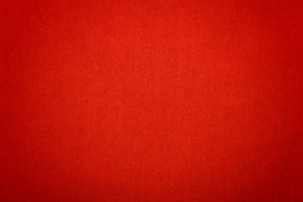 istock Scarlet red felt background texture close up 962974834