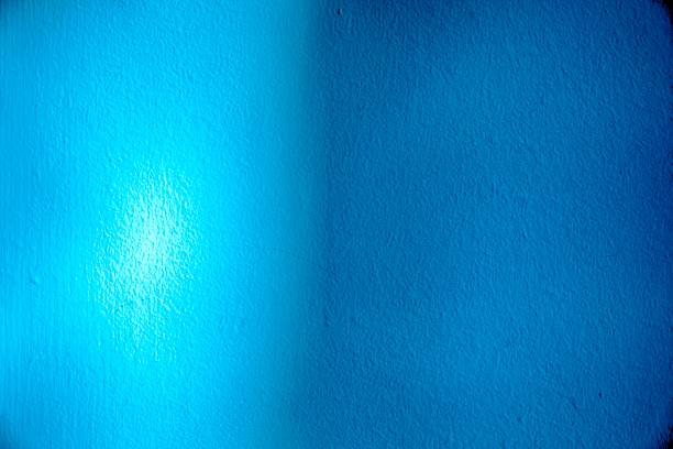 istock Ultra blue Plaster surface or stucco wall with shadow - indoors background 962975616