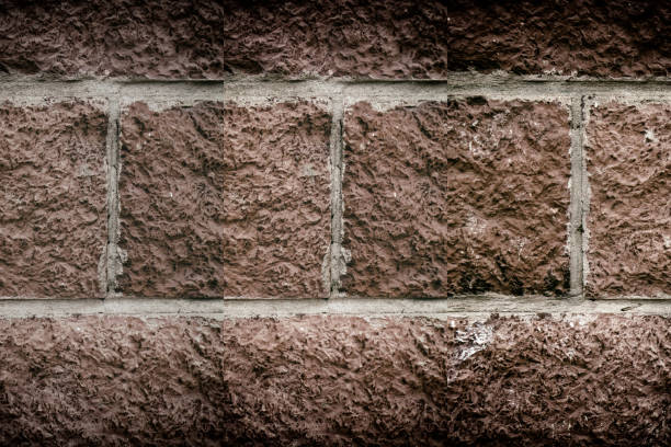istock Abstract background of tile brick wall. Texture surface of stone wall 962980032