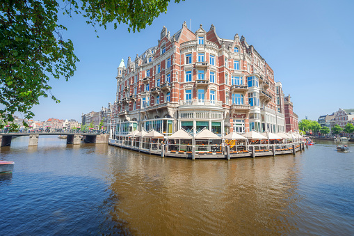 Luxury building on the Amstel river in Amsterdam