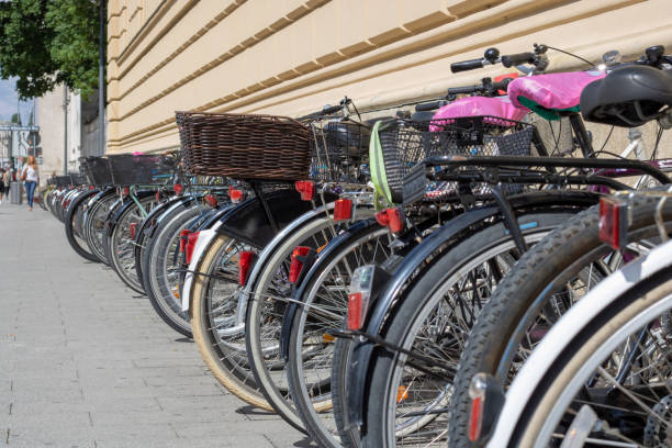 istock Many bikes on the street - side view 962983624