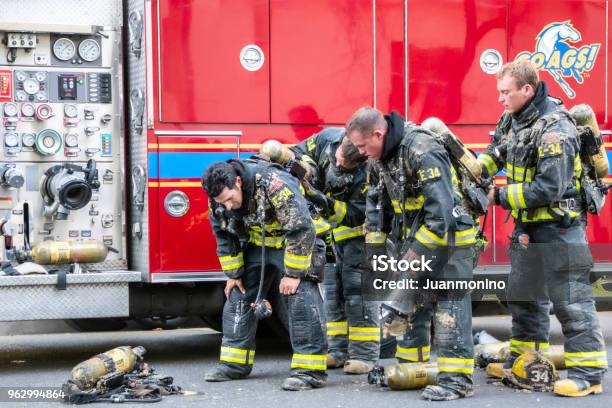 Fireman At Work Firemen At Work Stock Photo - Download Image Now - Firefighter, Davis ...