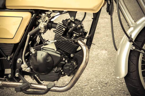 istock Vintage motorcycle exhaust pipes.vintage tone 963034040