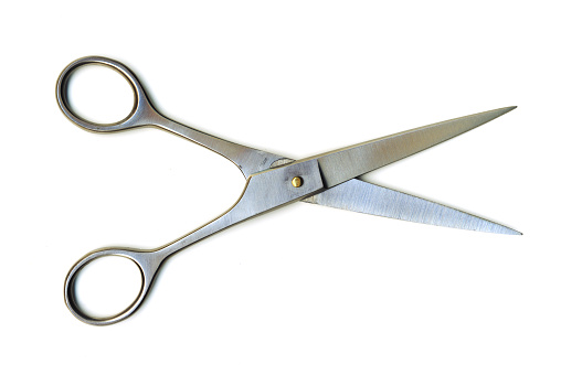 Pair of sharp hairdressing scissors, ready to cut