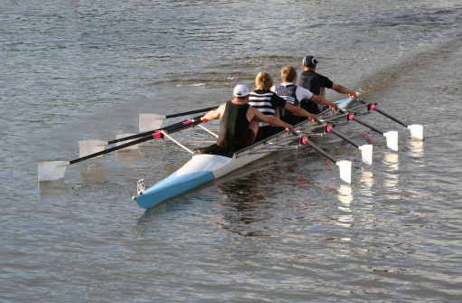 St Neots, Cambridgeshire, England -  July 23, 2022: Ladies coxless fours on the river Ouse Cambridgeshire.