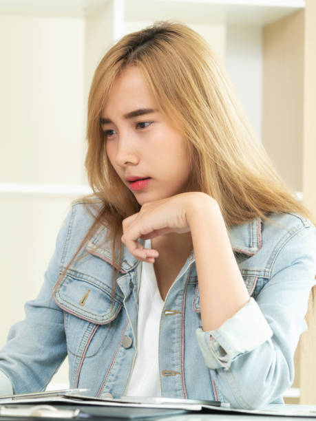 istock Creative woman thinking or planning in the office. 963085078