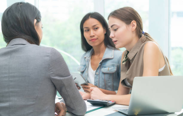 istock Multicultural businesswomen in group meeting. 963085136