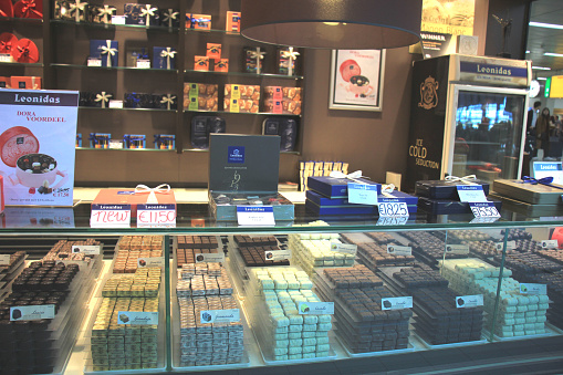 Amsterdam Schiphol Airport, the Netherlands - april 14th 2018: Leonidas Chocolate store at Schiphol Plaza, shop exterior