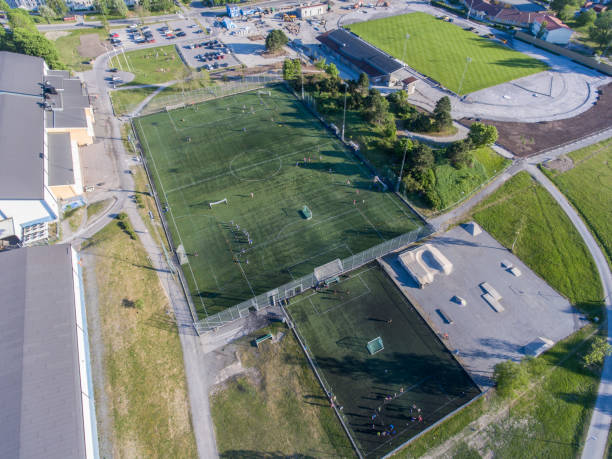 istock Aerial view over a soccer playing field 963089092